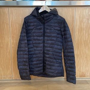 Lululemon Pack It Down Jacket - size 8. Worn once. Deep camo.